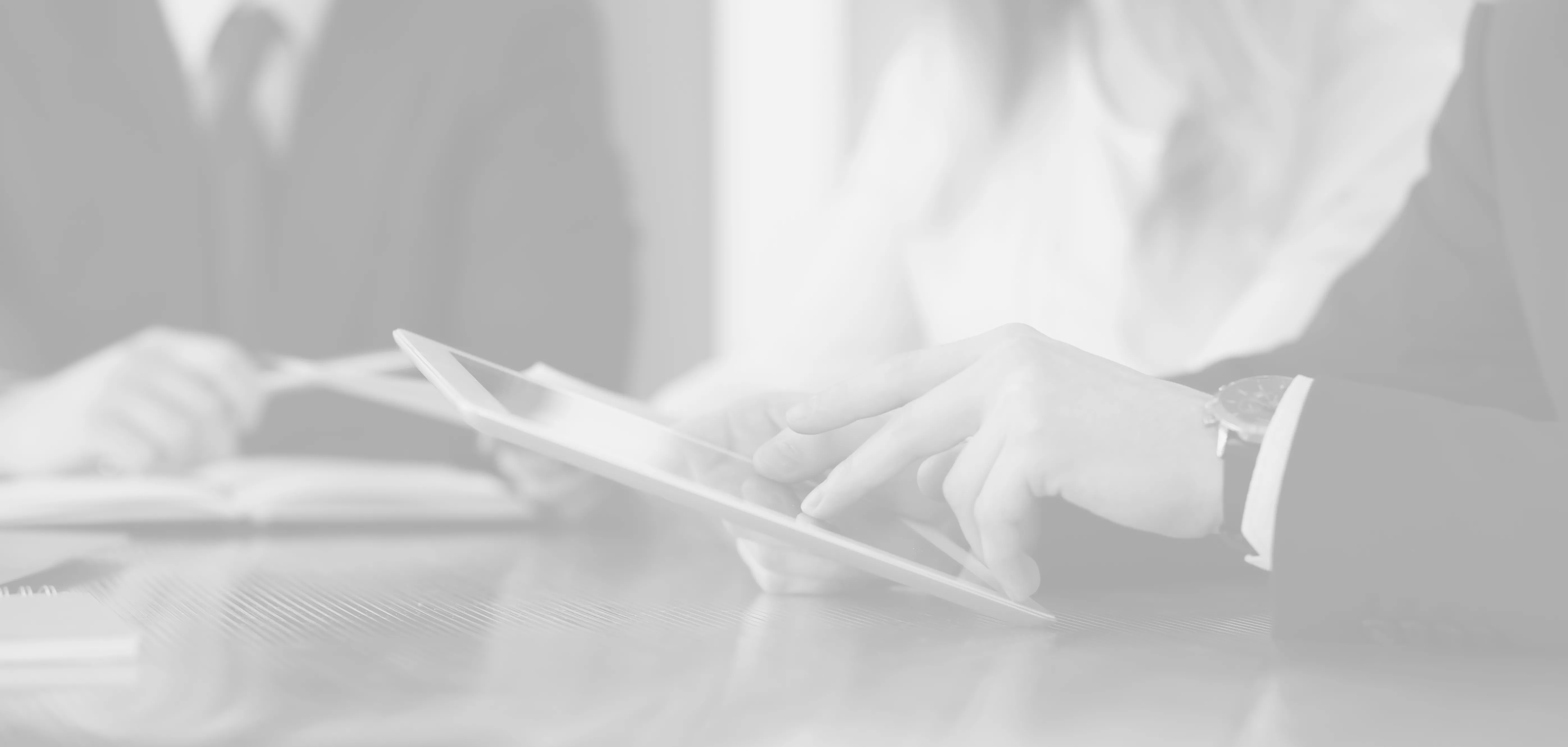 Person typing on tablet